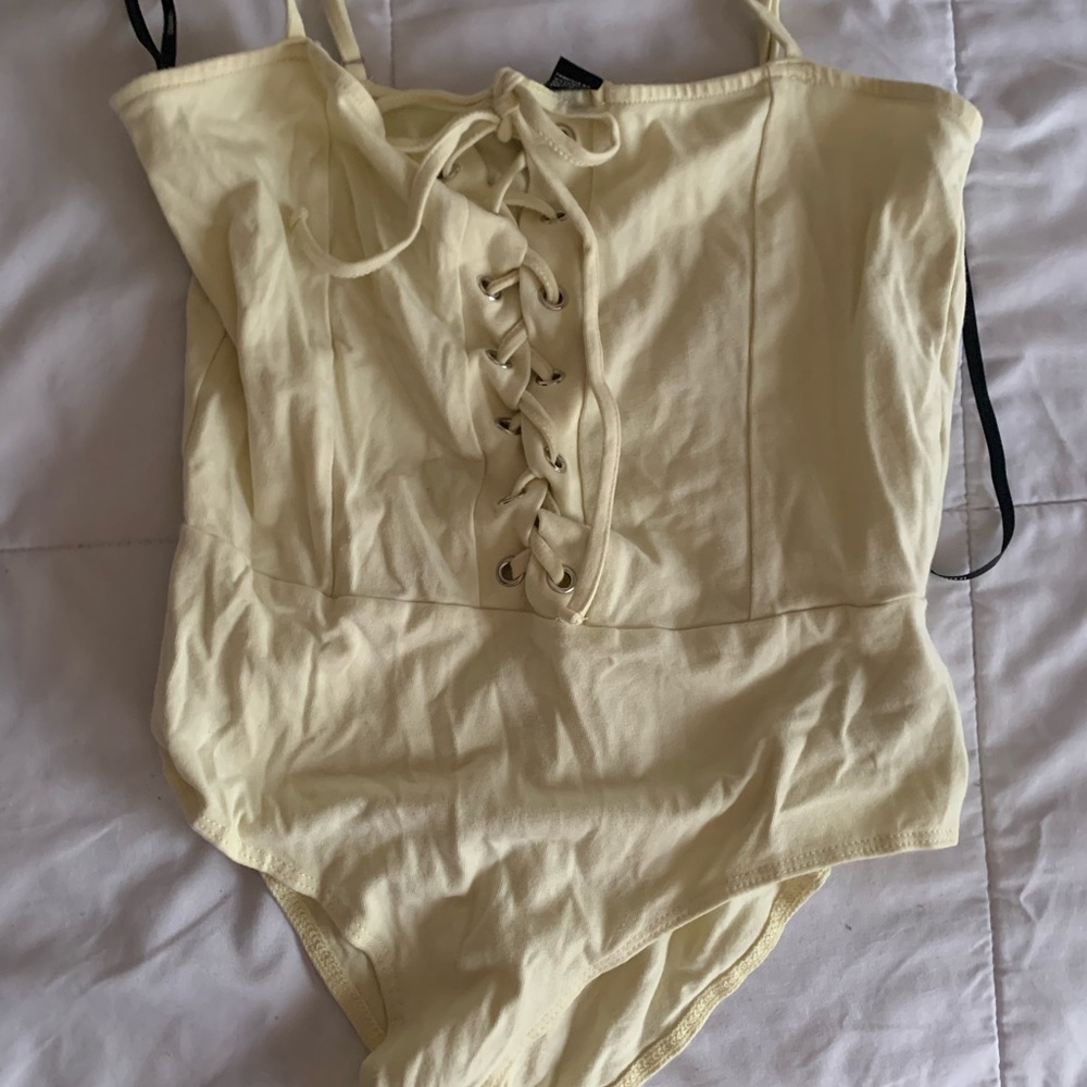 Yellow body suit